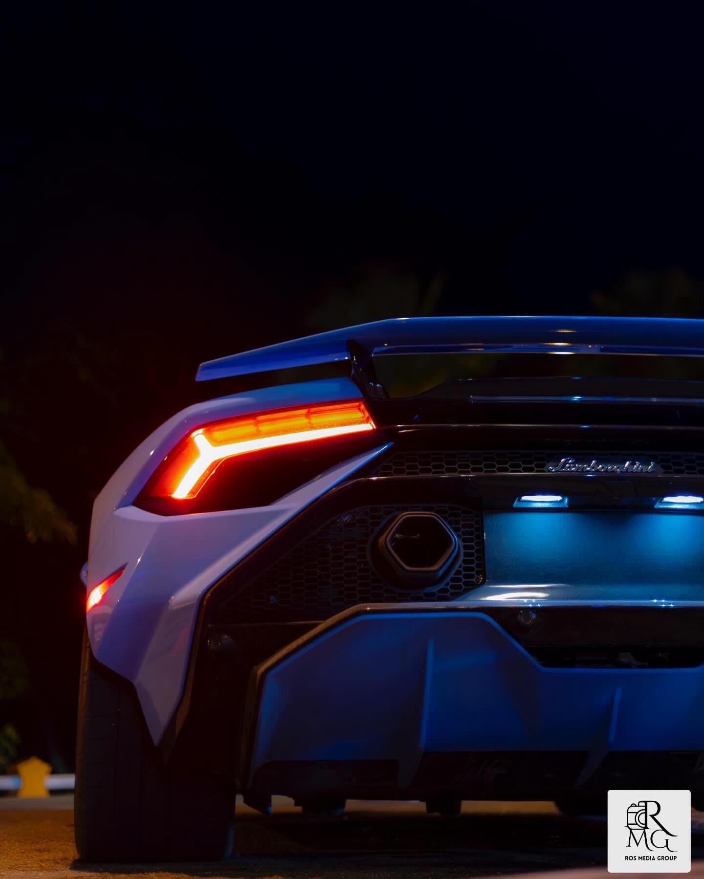 Lamborghini seen from behind in the dark before a night run